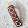 Barrettes à cheveux en acrylique de luxe pour filles, jolie personnalité, lettres G, styliste, épingles à cheveux en pierre de cristal colorée, cadeau de marque