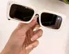 Projektanści okulary przeciwsłoneczne dla kobiet prostokątne okulary przeciwsłoneczne 0543 Czarne różowe okulary Lunettes de Soleil UV Ochrona z pudełkiem