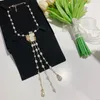 Naszyjniki wiszące marka mody biżuteria dla kobiet łańcuch perłowy gałęzi jasnobrązowy kolor żywicy krzyżowy Crystal c White