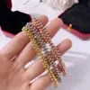 Choque de brazaletes de brazalete de brazalete Goldio de oro 18k Nunca se desvanezca la réplica oficial de la joyería de alta calidad Estilo clásico HIG4144059