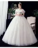 Inne suknie ślubne Elegancka szyja łodzi Piękny koronkowy kwiat Szczupły suknia ślubna plus rozmiar wykonany na zamówienie vestidos de novia up dressother