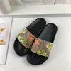 Nouvelle marque ggucci pantoufles mode féminine sexy pantoufles de plage à rayures brocart floral pantoufles pour femmes et hommes tongs plates sandales à glissière en caoutchouc avec boîte.