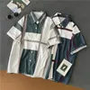 レディースブラウスの格子縞のヴィンテージターンダウンカラーハーフスリーブサマーカジュアルルーズストリートウェアユニセックス韓国カップルシャツ