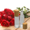 Glass Essential Oil Roll On Bottles with Stainless Steel Roller Balls and Bamboo Lid 5ml 10ml 15ml Refillable Clear Perfume Sample Bottle