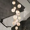 Lampadari moderni a LED in cristallo di marmo Lampade a sospensione per scale Soggiorno Lampade a sospensione rotonde di lusso in cristallo Villa Apparecchi di illuminazione lunghi