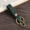 Nyckelringar Mini handväska hållare äkta kohud nyckelring äkta läderficka för bilnycklar ringklämma kvinnor män tillbehör handgjorda 2022 gåva