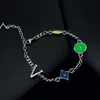 Europa Amerika Mode Sonnenaufgang Halskette Armband Männer Silber-farbe Hardware Gravierte V Brief Kristall Glas Lack Anhänger Schmuck Sets m00652