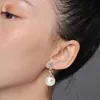 Boucles d'oreilles de perles blancs pour le pendentif de mariage boucles chic femmes en rabais de statistique de rond élégante
