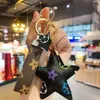 New designer favor flower keychain car key pendant creative key bag accessories pendants couple gift whole1350493
