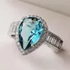 Anneaux De Mariage Huitan Magnifique Poire Bleu Ciel CZ Fiançailles Pour Les Femmes Brillant Accessoires Féminins Fête Anniversaire Anneau Bijoux À La Mode Rita2