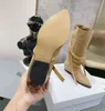 2023 Topselling selling famosa marca meio boots designer feminino clássico de luxo vintage tira de tira de tira booties de couro genuíno suave para menina