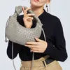 New Woven Ox Horn Bag Female Hand-held Cloud Korean Version One Shoulder Messenger Basket Armpit Bag 220426