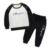 Sweats à capuche Garçons Filles Mode Solide Vêtements Ensembles couleur Rouge Noir Gris Rose Automne Hiver Hip Hop Sweat À Capuche enfants Marque Casual Tops