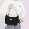 2023 Designer bag Super Popular triangle label women's spring Versatile Single Shoulder Bag small bag