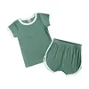 Set di abbigliamento a coste per bambini Estate Neonati maschi Ragazze in morbido cotone Completi per bambini Bambini Maglia a maniche corte Top + Pantaloncini elastici Articolo Pit Home Abiti casual M4106