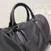 Mode Duffle Bag Högkvalitativ män Triple Black Nylon Handväskor Travsäckar Män hanterar Bagage Gentleman Business Tote Shoulder Strap