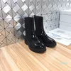 Designer de designer premium de designer de botas curtas Sapatos famosos de couro martin boots redondo cabeça de calcanhar médio knight chimney chelsea