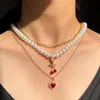 Catene Boho Crystal Heart Ciondolo ciliegia Collana girocollo con perle per donna Multistrato Farfalla Collane a catena in oro Gioielli alla modaCatene