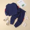 Set di abbigliamento per bambini Tuta per bambini Ragazzi Moda Giunzione coreana Primavera e autunno Set sportivo Manica lunga Colore Tempo libero 3 colori PSK178