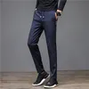 Winter heren warme licht fleece casual broek slanke klassieke joggingbroek effen kleur Koreaanse stijl winddichte broek man 28-38 220325