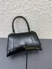 2022 Äkta läder timglashandtag crossbody väskor kvinnor män på lyxdesigner mode shopping plånbok kuvert kortfickor handväska axelväska