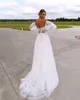 Abiti da sposa con perle da spiaggia Illusion Scollo a V profondo Abiti da sposa Maniche lunghe Una linea Sweep Train Tulle Bohemian robe de mariee