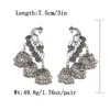 Dingle ljuskrona kvinnors vintage silverfärg påfågel jhumka örhängen smycken turkiska snidade klockor uttalande stam zigenare juvelydang