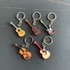 Mini Mini Instrument Musical Keychain Cute Silicone Guitar Piano Saxofone Chain Chain Backpack Car Jóias Músicas