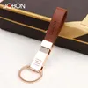 Keychains 브랜드 Jobon 고급 키 체인 여성 남성 커스텀 레터링 가죽 자동차 홀더 금속 가방 펜던트 선물 보석 리키 체인 Fier22