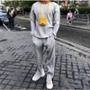 Herenbroeken hoogwaardige mannen vrouwen geplooid homme plisse joggers joggers trekstring rechte mode casual zomer ijs zijden broek