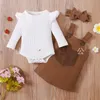 2ピースの幼児の女の子の服セットは長袖の白いティーとボタンのデザイン全体のキッズドレスセット1061 E3