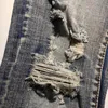 Jeans da uomo strappati per uomo in pelle con lettera patchwork collant di marca pantaloni da moto Homme Marque De Luxe buco blu