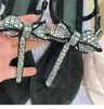 Mode kvinnors sandaler shinestone bowtie designer flip flops fairy wind casual sommarskor