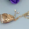 Porte-clés cristal strass alliage porte-clés pour femmes sac à main bibelot porcelaine fondue grand sac porte-clés porte-voiture Chaveiro Emel22