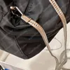 Mini dragstring hink väska kvinnor handväska koppling silver kedja crossbody axelväskor designer nylon duk plånbok totes handväska 5 färger