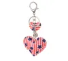 Zamówienia Kształt Serca Klucz Pierścień Dzień Niepodległości Flaga Party Favor Colorful American Flag Breloki Niezależność Dzień Key Chain Souveni