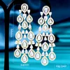 Dangle Chandelier Godki Trendy Celebrity المفضلة الزركونيا الزركونيا نساء إسقاط الأقراط لزفاف شرابة الحرس الزفاف Mujer Mod 2022