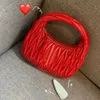 Iconico designer Wander Matelasse Nappa Hobo Bags Bellissima borsa a tracolla con linee a bolle 3D Hardware dorato Scritte in metallo Hasp Baguette Zip frontale Fodera in cotone Borsa con patta