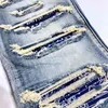 Jeans Amirrs T-shirts Designer 2023 Jean Style Industrie lourde Lavage Dommages à l'eau Trou Taille Fleur Impression Câble Épissage TT6X
