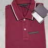 Luxur Designer Summer Men's Polo Shirt Triangle Mönster LAPEL Kort ärm T -skjorta Business Casual Jacket Top