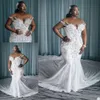 Plus -storlek bröllopsklänning vestido de novia afrikansk kristall sjöjungfru brudklänningar med lång tåg ren nackfiskstopp brudklänning