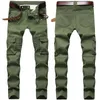 Jeans masculinos Men Pleated Slim Moda Moda Multi-Pockets Camuflagem Men Fantas de Cargo Masculino Exército Denim Verde Longo Jeansmen