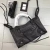 ترقية المصممين حقيبة النساء TOTE New France Luxurys دراجة نارية حقائب سيدة حقائب اليد الرجال Crossbody Shouler محفظة سعة كبيرة جلد طبيعي