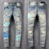 Designer Mens Jeans European American Ripped Men High Street Fashion Brand Cycling Motorcykel broderi n￤ra passande smala blyertsbyxor toppar