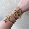 10 stks Leuke Stijl Ballon Hond Elastische Good Luck Ronde Kraal Vergulde Bedelarmband Voor Dames Mode-sieraden Geschenken