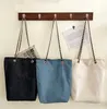 Lienzo Ocio Cadena Bolsas de compras Moda Patrón de letra simple Diseñador de vaquero Totes para mujer Gran capacidad Bolso tricolor Bolso de hombro