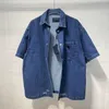 Camisas de diseñador de ropa para hombre Tamaño de EE. UU. Versión suelta de camisa de jeans casual azul Camisas de hombre de lujo con diseño de un solo pecho de alta calidad