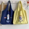 Mulheres Bolsas de ombro 2022 Bolsa de lona Bag Girl Shopper Primavera e verão Fashion Casual Cartoon Ilustração Bolsa de impressão