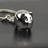キーホルダーかわいい絶妙な小さな豚のキーホルダーのファッションバッグチャームアクセサリー合金車のキーホルダーペット動物ペンダントチェーンギフト
