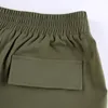 Calças femininas Capris Logo Womens Cargo Troushers com bolsos verdes de rua de rua de alta cintura Green Baggy para mulheres de outono roupas